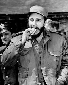 UNITED STATES - APRIL 24: Fidel Castro takes a bite out of a hot dog at the Bronx Zoo. (Photo by Hal Mathewson/NY Daily News Archive via Getty Images)